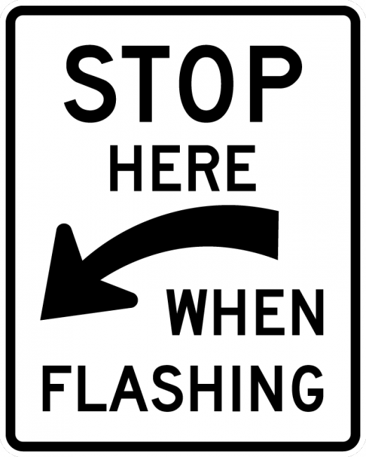 R8-10-Stop Here When Flashing – Municipal Supply  Sign Co.