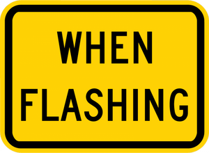 W16-13P-When Flashing (plaque) - Municipal Supply & Sign Co.