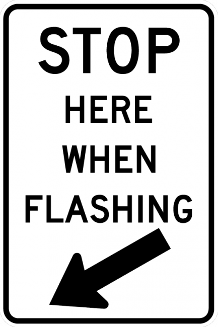 R8-10-Stop Here When Flashing - Municipal Supply & Sign Co.