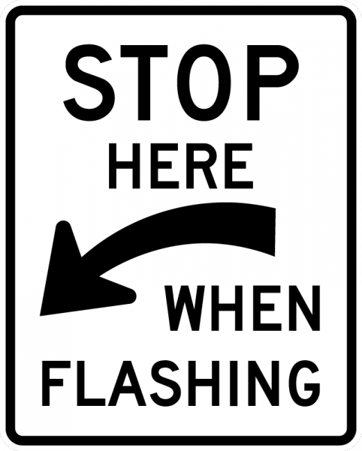 R8-10-Stop Here When Flashing - Municipal Supply & Sign Co.